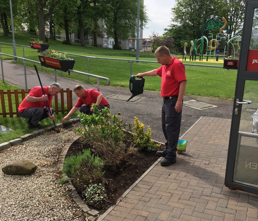 GHA staff at the small garden at Kingsway Court