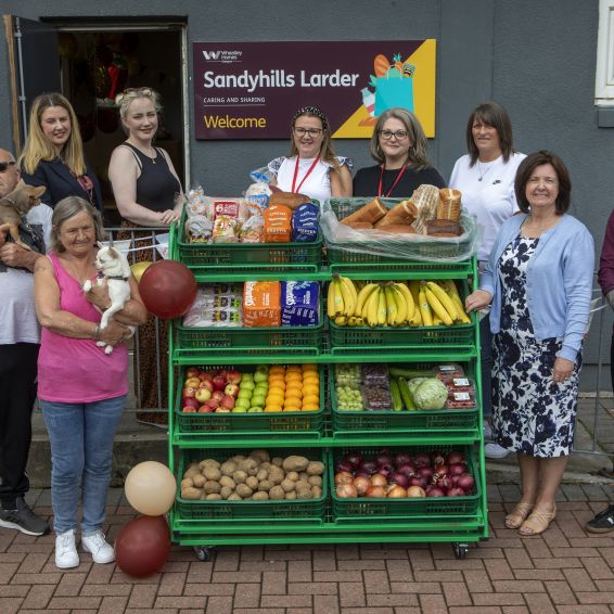 Picture of tenants and staff outside Sandyhills larder