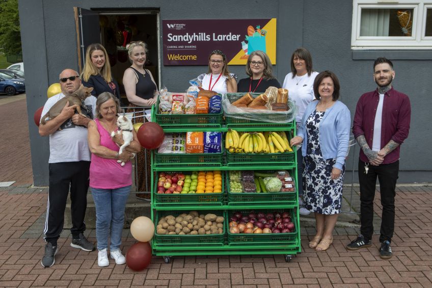 Picture of tenants and staff outside Sandyhills larder