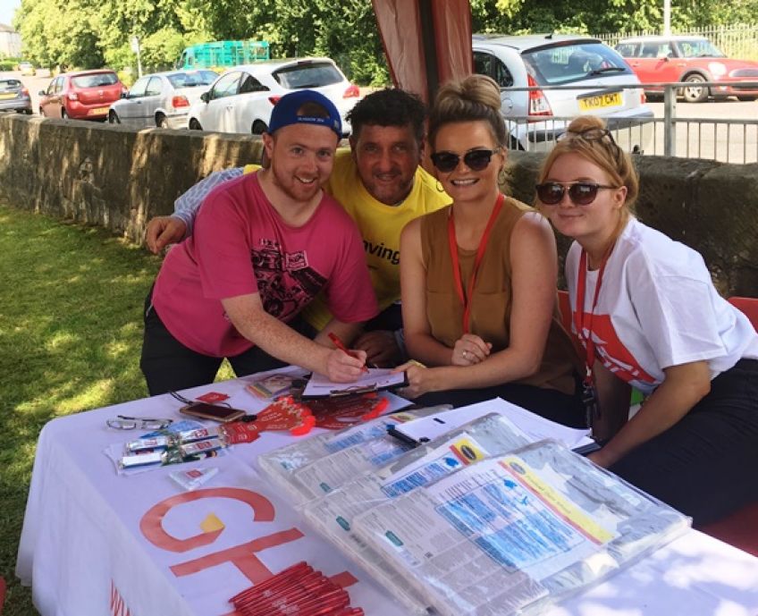 Tenant David signs up for MySavings at GHA community event