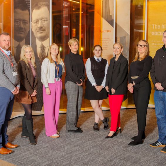 From left, Wheatley mentor Brian Haddow; Sharon McIntyre, Chief Exec of MCR Pathways; Laura Crumlish and Lynne Mitchell of Wheatley Foundation; Holly Dillon; City Building mentor Louise Allan; Mhairi Taggart of MCR Pathways; and Wheatley mentor Kevin Smith.