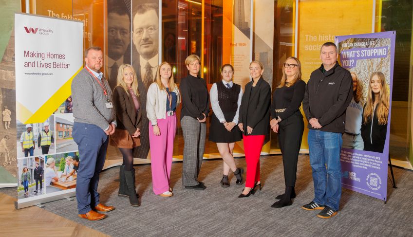 From left, Wheatley mentor Brian Haddow; Sharon McIntyre, Chief Exec of MCR Pathways; Laura Crumlish and Lynne Mitchell of Wheatley Foundation; Holly Dillon; City Building mentor Louise Allan; Mhairi Taggart of MCR Pathways; and Wheatley mentor Kevin Smith.