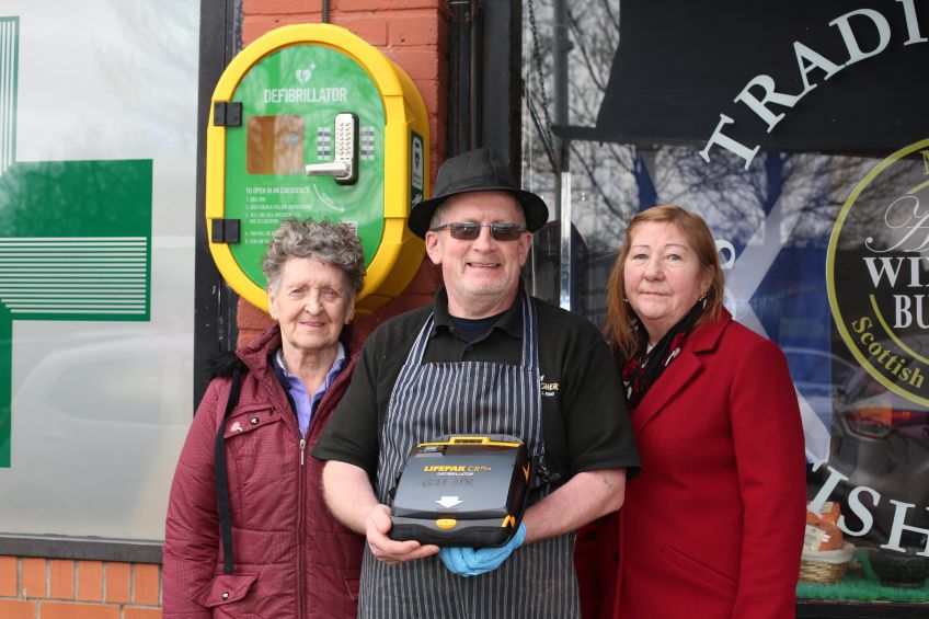 tenants join Balornock butcher Donnie Shaw in calling for more defibrillators